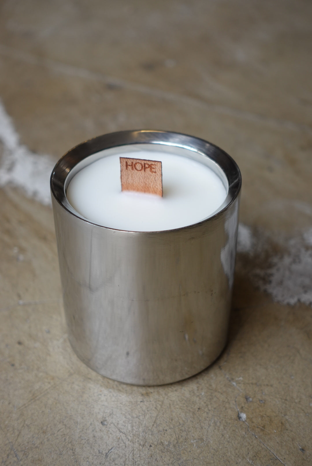 Stainless steel candle with a HOPE wick